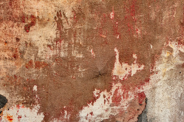 Texture of a concrete wall with cracks and scratches which can be used as a background