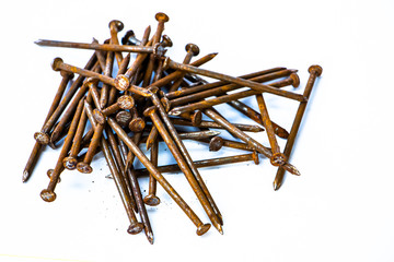 Rusty Nails. The old iron nails on white background.