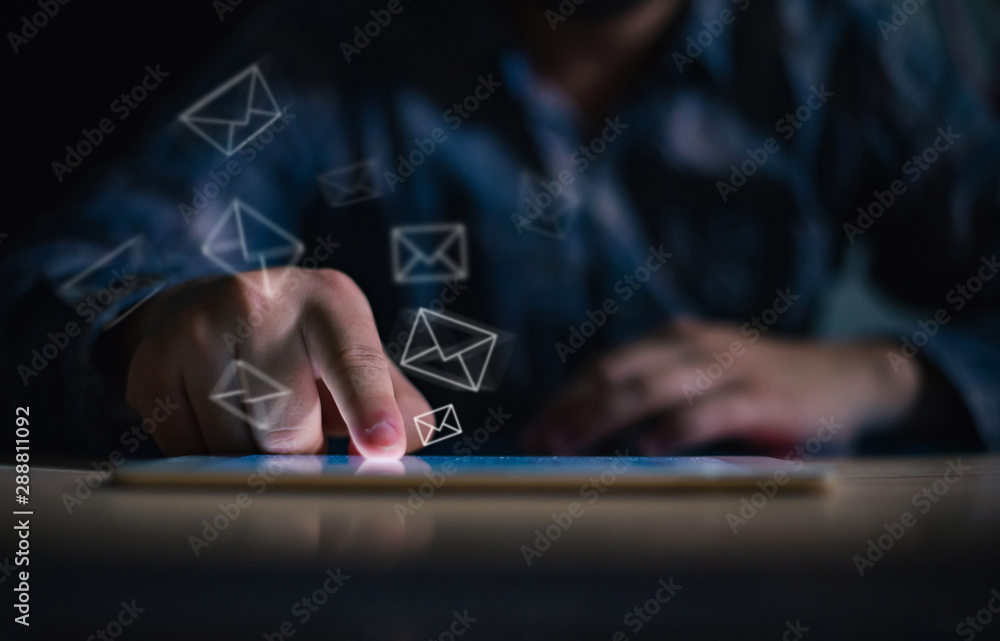 Poster low key man hand using phone or mobile or smartphone with send and receive email icon, email busines