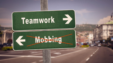 Street Sign to Teamwork versus Mobbing