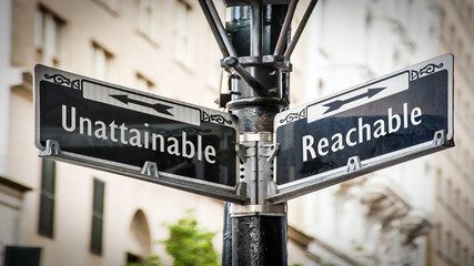 Obraz premium Street Sign to Reachable versus Unattainable