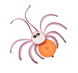 Funny spider made with fresh vegetables on white background