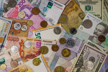 Background of banknotes and coins from different countries
