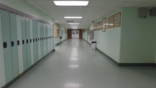 Empty school hallway slow motion cinematic