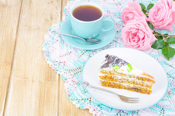 Slice of carrot sponge cake with cream