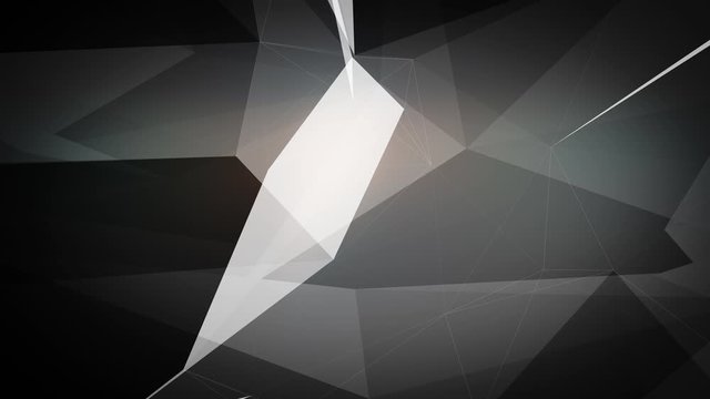 Black and White animation of triangles with slow motion. Spinning camera. Seamless loop.
