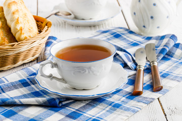 cup of tea in a beautiful cup for breakfast at home