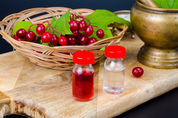 Natural oils, tinctures from fresh berries. Photo