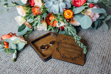 Wedding floristics and details. Wedding invitations on floor.