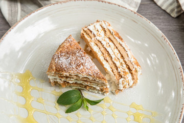 Food Table Celebration Delicious Party Meal Concept. A lot of food on the wooden table: meat, vegetables, desserts, garnishes.  Foodset from Georgian dishes. Caucasian food