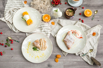 Food Table Celebration Delicious Party Meal Concept. A lot of food on the wooden table: meat, vegetables, desserts, garnishes.  Foodset from Georgian dishes. Caucasian food