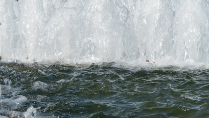 splashes and waves of the fountain, close-up