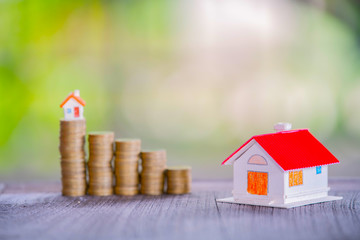 Plants and coins for watering can be used to guide financial growth 