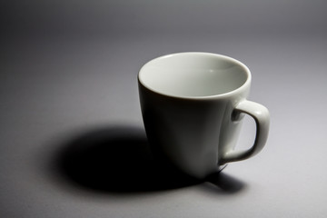 white cup on background