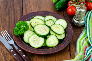 Vegetarian diet salad of fresh cucumber slices.