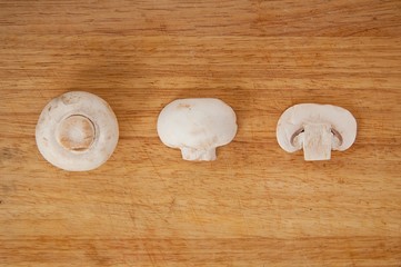 fresh mushrooms on a chopping board