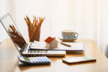 Lease / Rental agreement document with keys and pen. Highlighted text