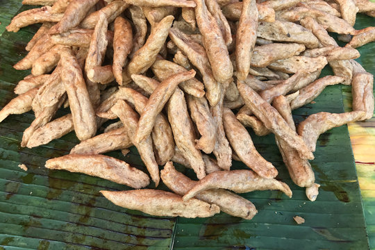 Keropok lekor or wet crackers are made from a mixture of sago or tapioca flour dough and pounded fish flesh, fried and served with a hot chili dip. 