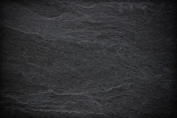 Dark grey black slate background or texture. black stone