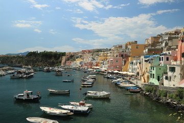 Fototapeta na wymiar Procida Island near Naples. Port of Corricella frequented by fis
