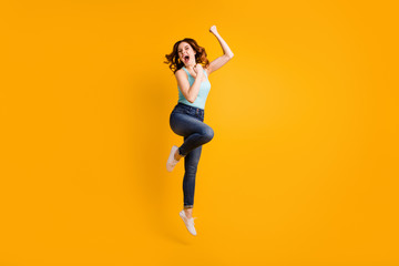Full length photo of jumping high lady celebrate best achievement wear casual outfit isolated yellow background