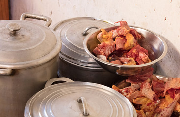 Chopped chicken in a very simple kitchen, selective focussed