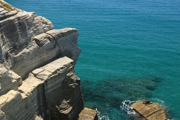 Volcanic rocks and rocks in the Mediterranean sea of Ischia. Clo