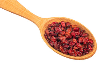 Dry barberry in spoon