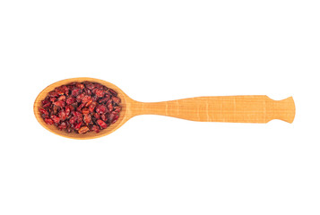Dry barberry in spoon