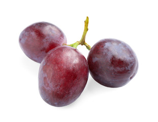 Fresh ripe juicy pink grapes isolated on white