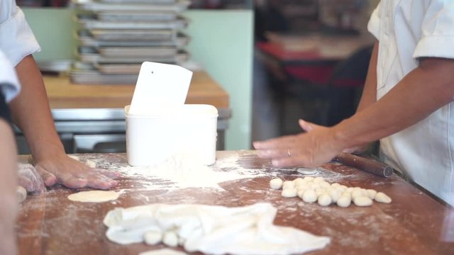 Cooking Video Slow motion Steps to make Xiao long bao It is Chinese dim sum dishes. Xiao long bao is made from bread flour mixed with wheat flour with minced pork filled with broth in the water.