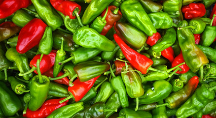 red hot chili peppers on wooden background
