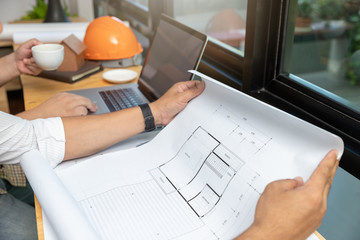 Engineer and Architect concept, Engineer Architects office team working with blueprints