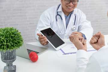 Healthcare and medical concept, Doctor explain heart disease symptoms and medical treatment to...