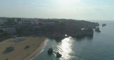 Aerial view of Praia dos Tres Irmaos (Three Brothers beach) in Alvor, famous tourist destination in Western Algarve Coast, Portugal.