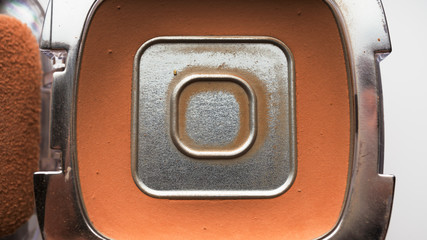 Used powder in powder box isolated on white