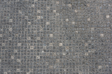 Small checkered gray stone brick ground texture background
