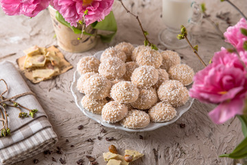 Coconut biscuit with caramel. Crispy and crumbly delicious cookies with natural ingredients: flour, nuts, seeds, pieces of chocolate, cocoa, fruit jams.