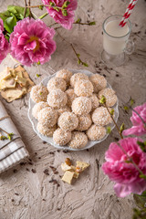 Coconut biscuit with caramel. Crispy and crumbly delicious cookies with natural ingredients: flour, nuts, seeds, pieces of chocolate, cocoa, fruit jams.