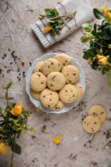 Chocolate biscuit. Crispy and crumbly delicious cookies with natural ingredients: flour, nuts, seeds, pieces of chocolate, cocoa, fruit jams.
