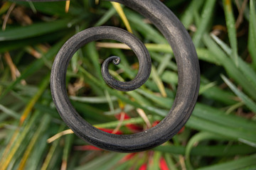 An abstract swirling iron shape