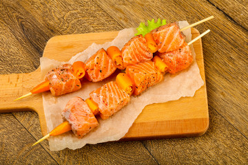 Raw salmon skewer