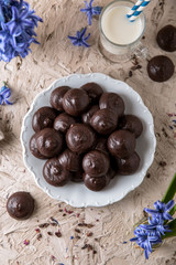 Chocolate biscuit. Crispy and crumbly delicious cookies with natural ingredients: flour, nuts, seeds, pieces of chocolate, cocoa, fruit jams.