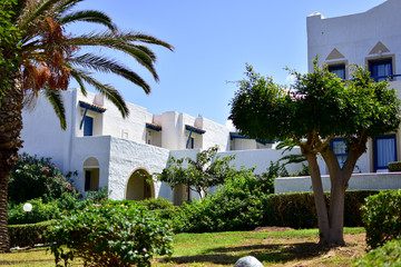 Fototapeta na wymiar Beautiful white houses of classic Greek architecture on the island of Crete.