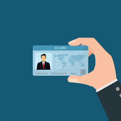 Businessman holding Id card.