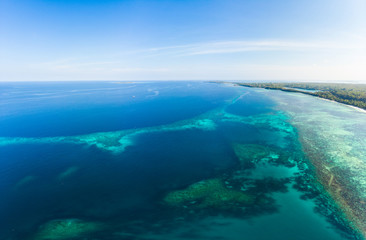 Naklejka na ściany i meble Aerial view tropical beach island reef caribbean sea at Pasir Panjang, Kei Islands, Indonesia Moluccas archipelago. Top travel destination, best diving snorkeling, stunning panorama.