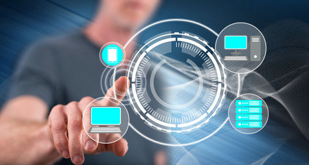 Man touching a devices connection concept