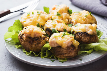 Champignon mushrooms stuffed with cheese,chicken and herbs baked in oven