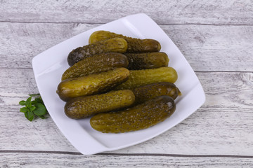 Pickled cucumbers heap in the bowl