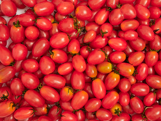 Fresh cherry tomatoes background